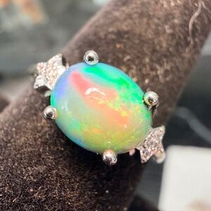 Ethiopian opal adjustable ring with green and orange flash